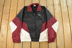 Vintage 1990s Nike Mini Swoosh Windbreaker Jacket Men's Medium