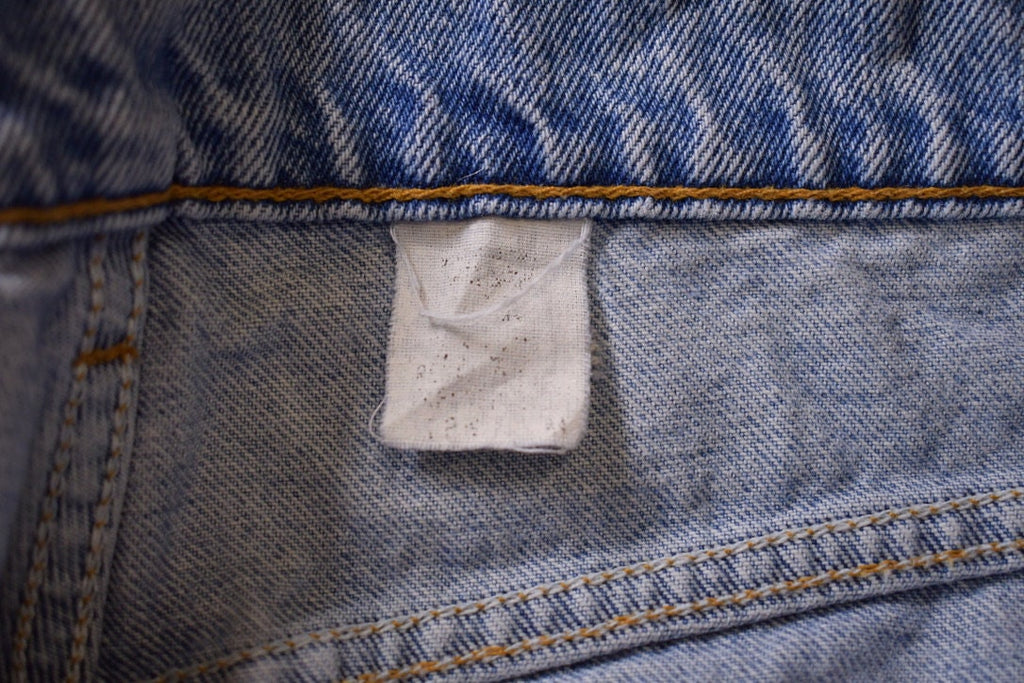 Vintage 1990s Levi's 550 Red Tab Denim Jeans Size 34 x 31