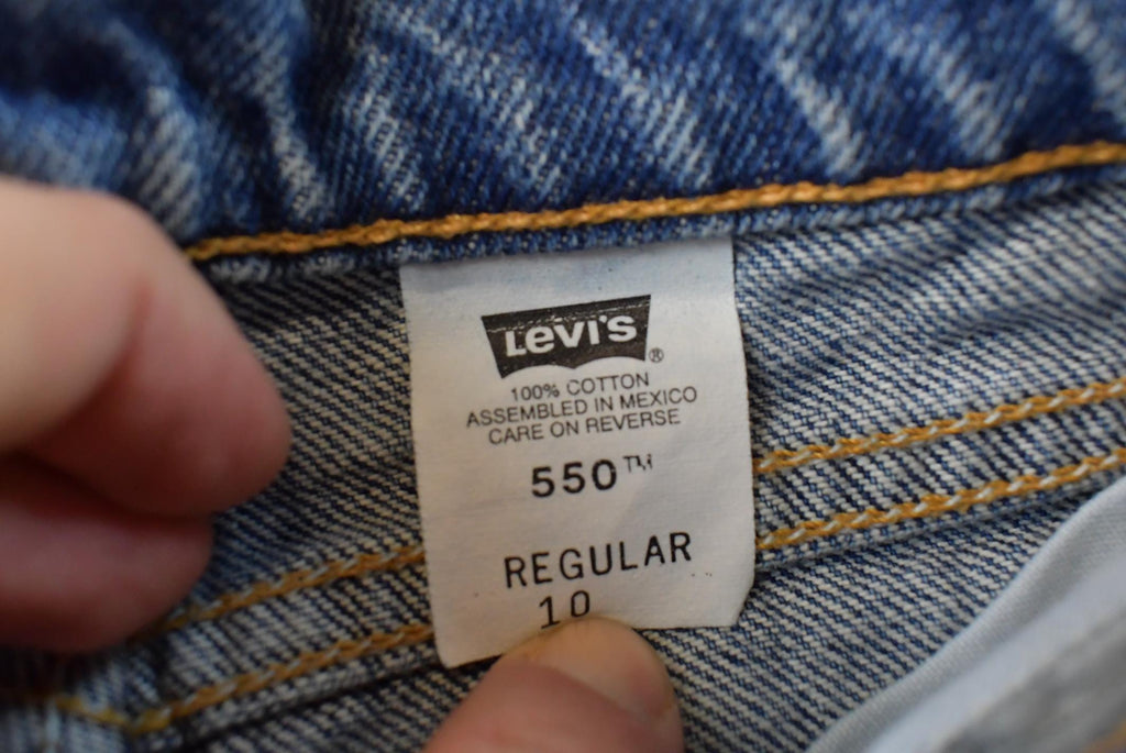 Vintage 1990s Levi's 550 Regular Fit Denim Blue Jeans Size 22 x 24.5 / 90s Levi's / Distressed Sun Faded Jeans / Streetwear