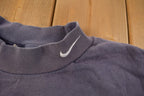 Vintage 1990s Nike Embroidered Mini Swoosh Long Sleeve Sweatshirt