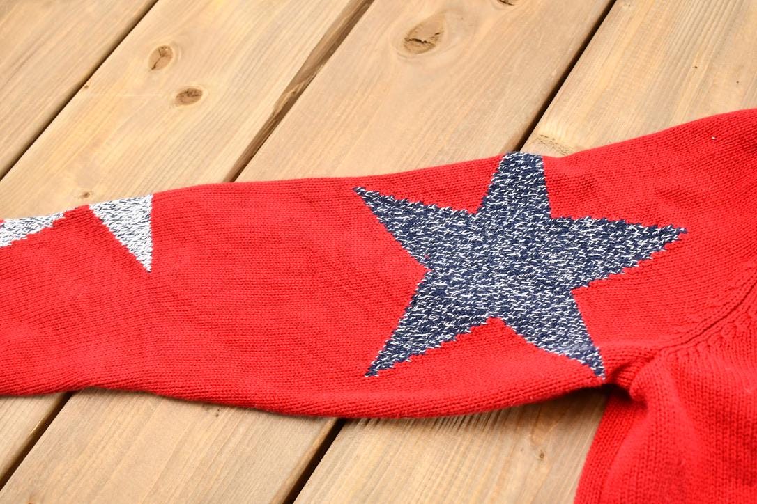 Vintage 1990s Women's Red Rolled Hem Norton Studio Star Pattern Knit Crewneck Sweater