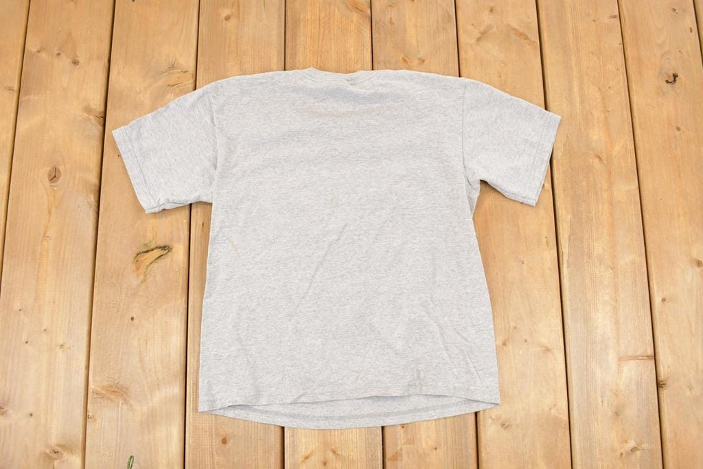 Vintage 1990s Green Bay Packers Brett Favre Cartoon Graphic Print Souvenir NFL T-Shirt Youth L