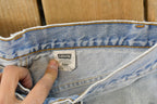 Vintage 1990s Levi's Distressed 550 Relaxed Fit Denim Jeans Men's 33 x 33 / 90s Levi's / Blown Out Sun Faded Jeans