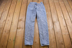 Vintage 1990s Levi's 550 Red Tab Jeans Size 26 x 23