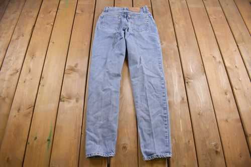 Vintage 1990s Levi's 550 Red Tab Jeans Size 26 x 23