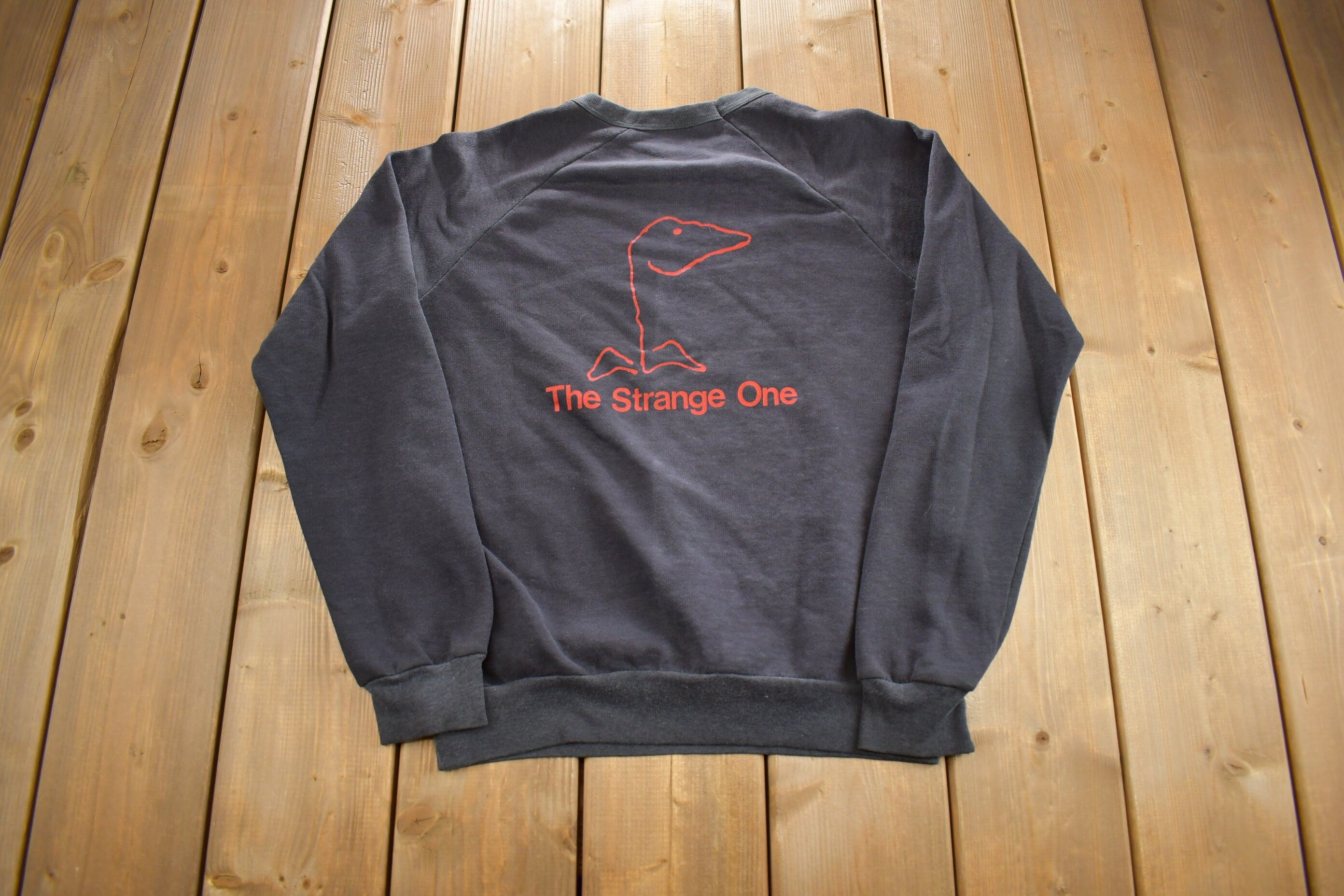 Vintage 1980s Crawley Films Production The Strange One Crewneck Sweatshirt Made In Canada