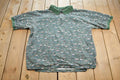 Vintage 1990s Warner Brothers Tasmanian Devil Tools Quarter Button Up Golf Shirt