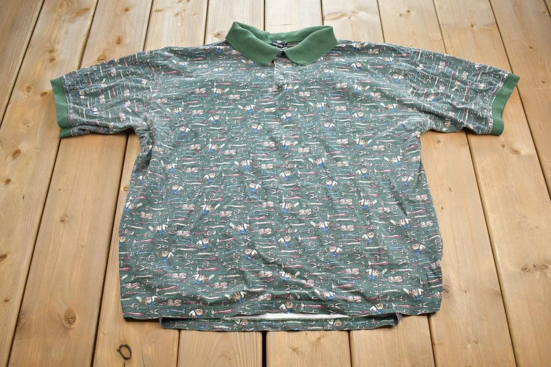 Vintage 1990s Warner Brothers Tasmanian Devil Tools Quarter Button Up Golf Shirt
