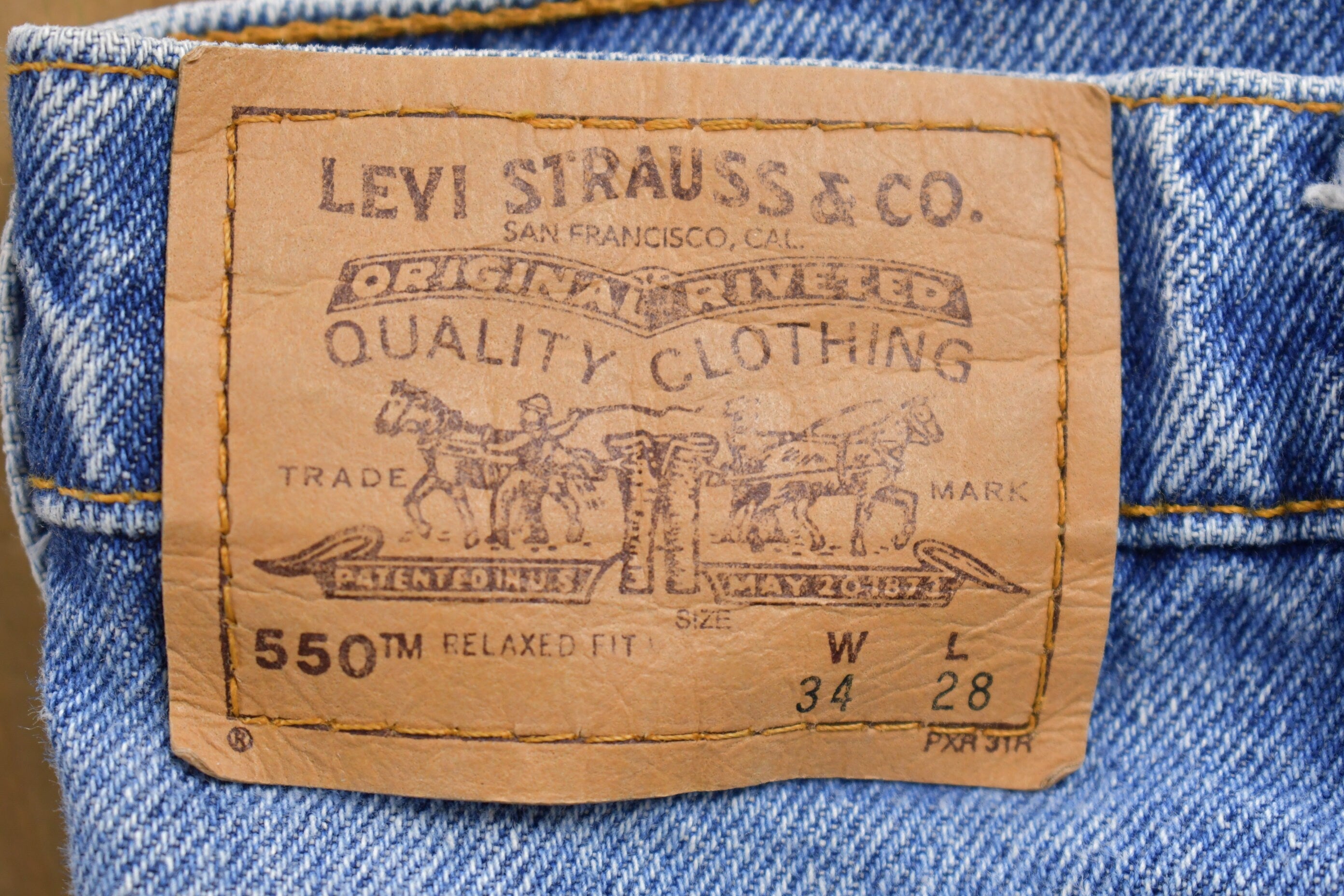 Vintage 1990s Levi's 550 Orange Tab Jeans Size 31 x 28.5