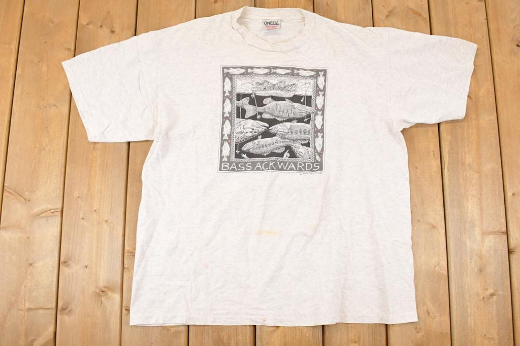Vintage 1988 Bass Awkward Comedy Fishing Graphic Print Souvenir T-Shirt Men's L