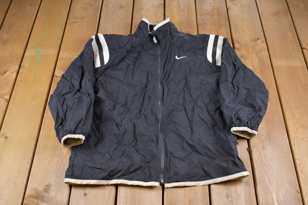 Vintage 1990s Kids Nike Swoosh Embroidered Windbreaker Jacket