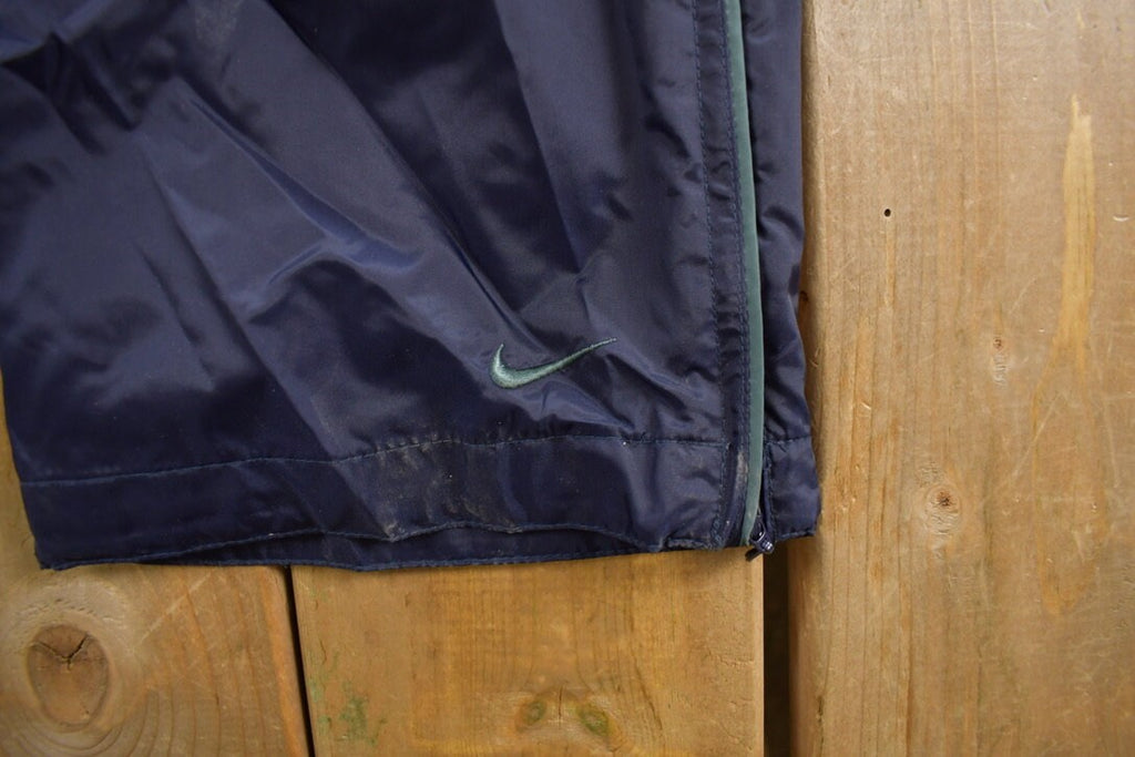 Vintage 1990s Nike Mini Swoosh Track Pants Size S