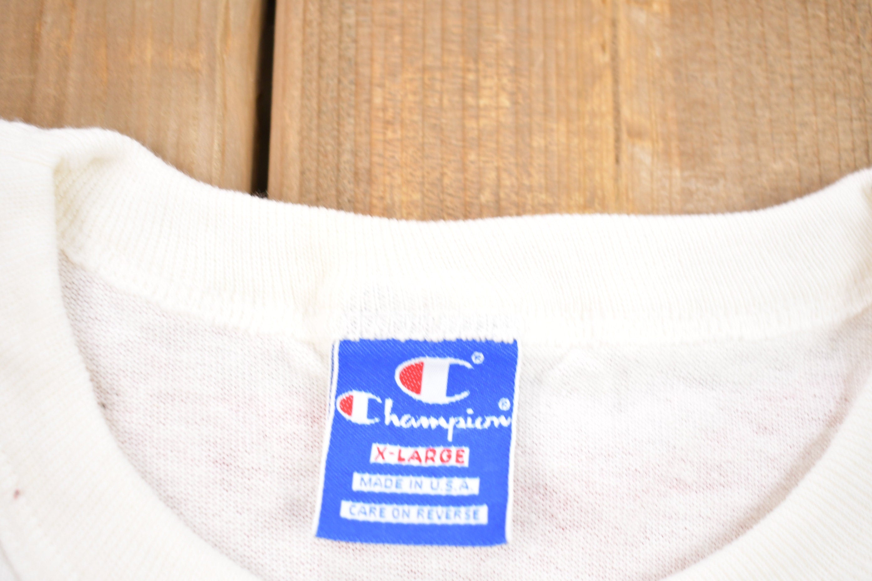 Vintage 1990s Champion Footwear Graphic T-Shirt