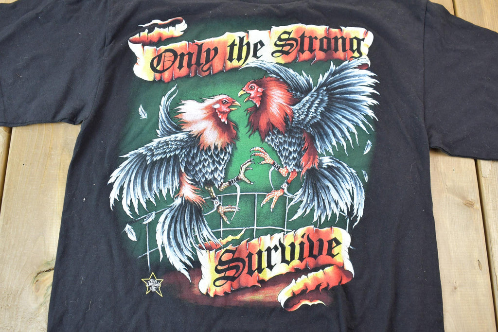 Vintage 1990s Single Stitch Only The Strong Survive Tultex T-Shirt Joke