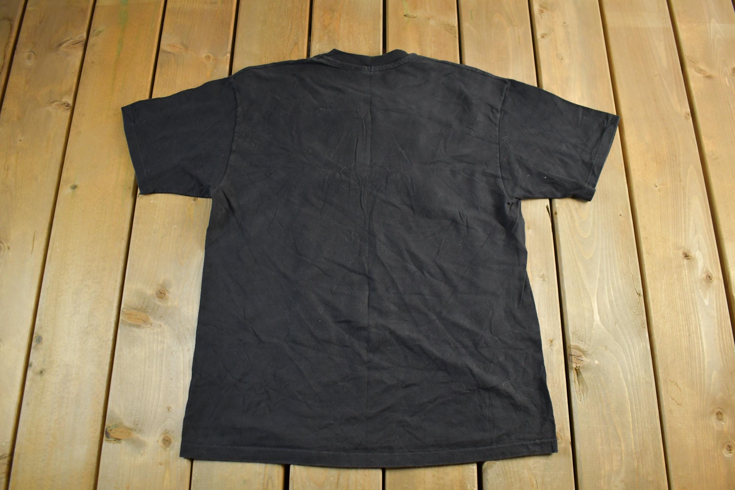 Vintage 1990s Brieland Graphics Glow In The Dark Eyes T-Shirt Men's Large