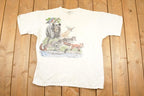 Vintage 1989 Harlequin Forest Animals FAB Outdoorsman Souvenir Travel T-Shirt Men's XL
