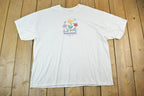 Vintage 1990s Floral Souvenir Single Stitch Graphic Print T-Shirt Made In USA