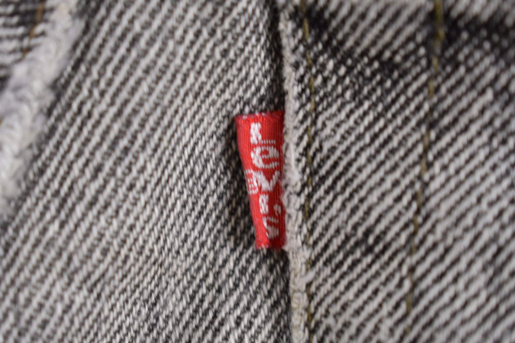 Vintage 1980s Levi's 505 Grey Light Wash Cut Offs