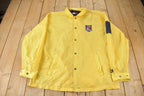 Vintage 1990s Tommy Jeans Yellow Snap Button Windbreaker Jacket