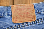 Vintage 1990s Levi's 560 Light Wash Loose Fit Tapered Leg Mom Jeans