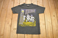 Vintage 1990s Minnesota Vikings NFL Graphic Nutmeg T-Shirt