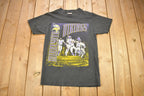 Vintage 1990s Minnesota Vikings NFL Graphic Nutmeg T-Shirt