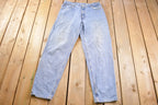 Vintage 1990s Levi's 550 Red Tab Jeans Size 34 x 33