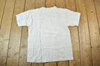 Vintage 1990s Ellis Island Souvenir Single Stitch Graphic Print T-Shirt Made In USA