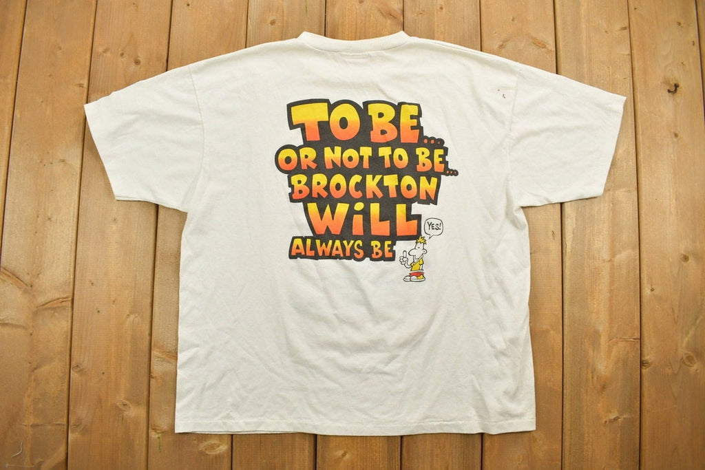 Vintage 1990s Brockton H.S Funny Graphic T-Shirt / Streetwear / Retro / Single Stitch / Hum Eur / 90s Graphic Tee / Colligate / Cartoon