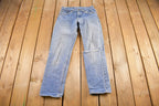 Vintage 1990s Distressed Levi's Red Tab Denim Jeans Size 29 x 27