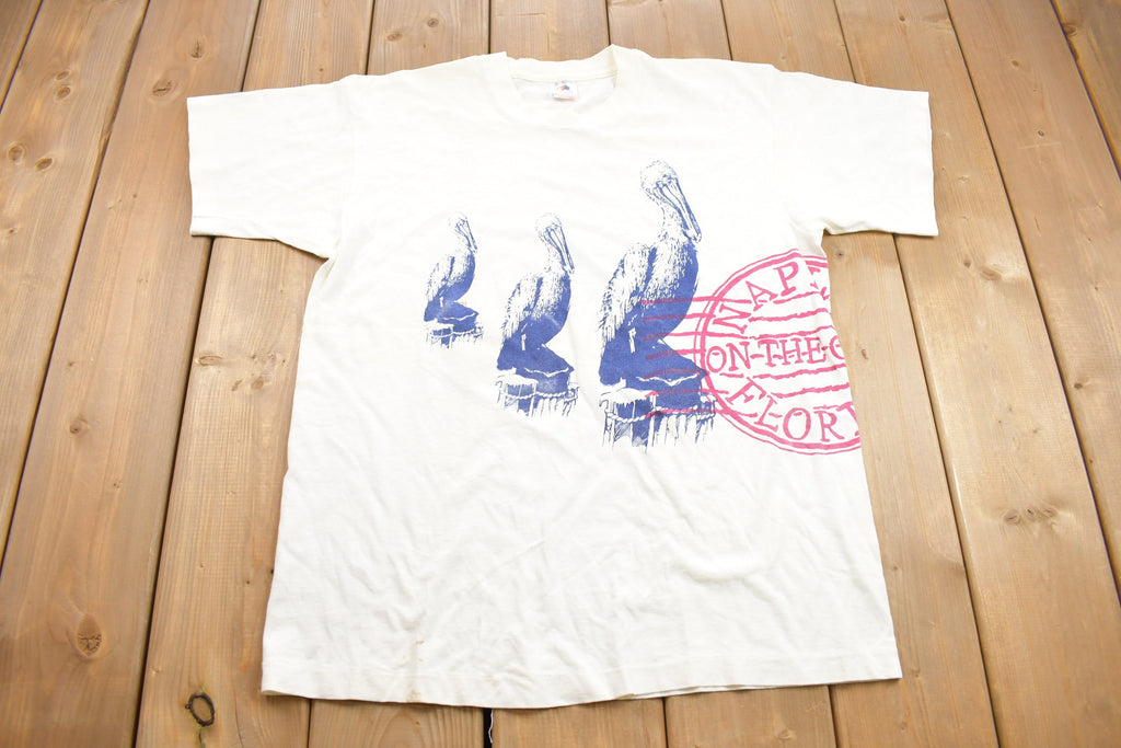 Vintage 1990s Naples Gulf of Florida Pelicans Graphic T-Shirt