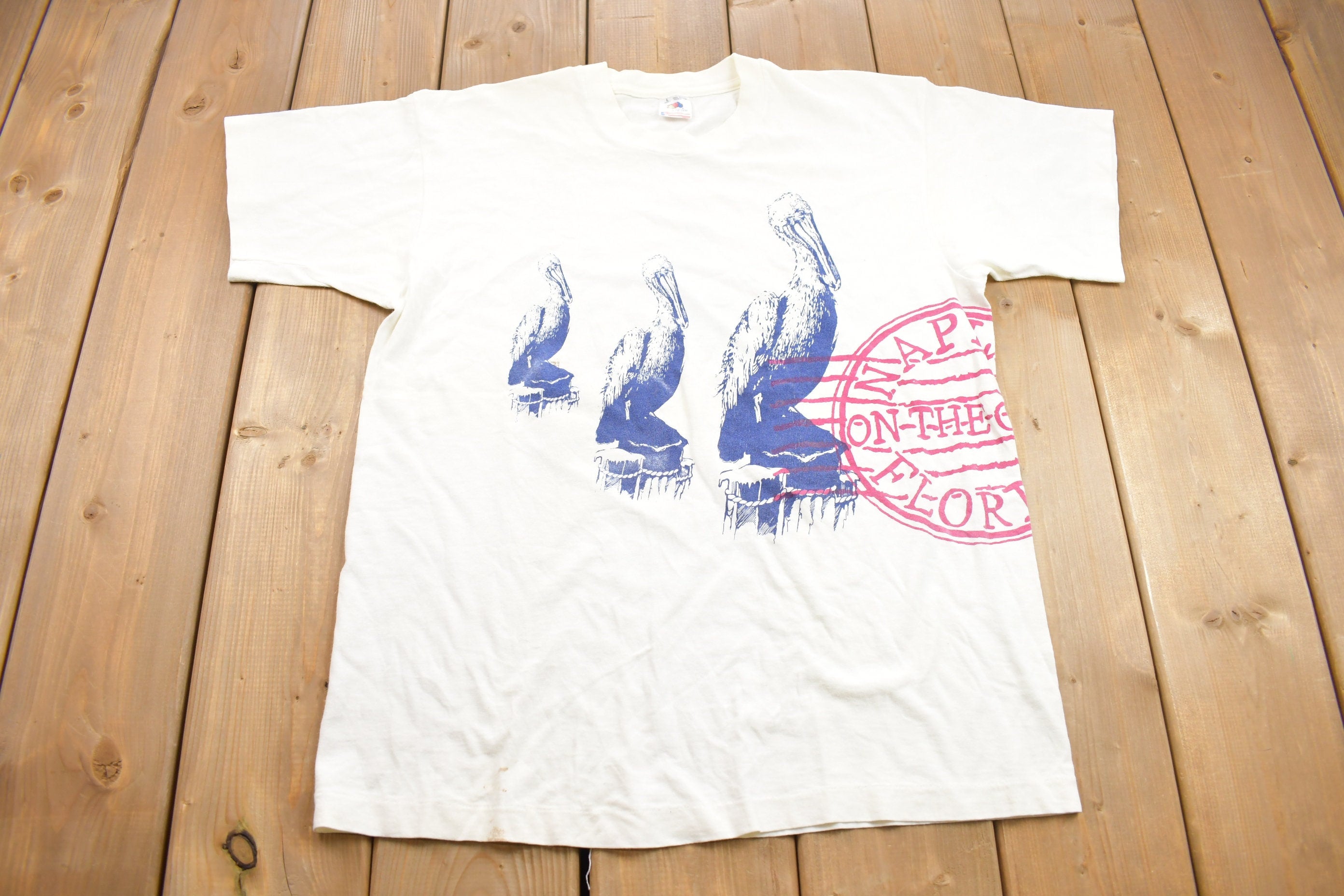 Vintage 1990s Naples Gulf of Florida Pelicans Graphic T-Shirt
