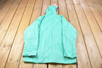 Vintage 1990s Woolrich Womens Blue Snap Button Raincoat