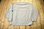Vintage 1990s Fila Spell Out Fleece Crewneck Sweater