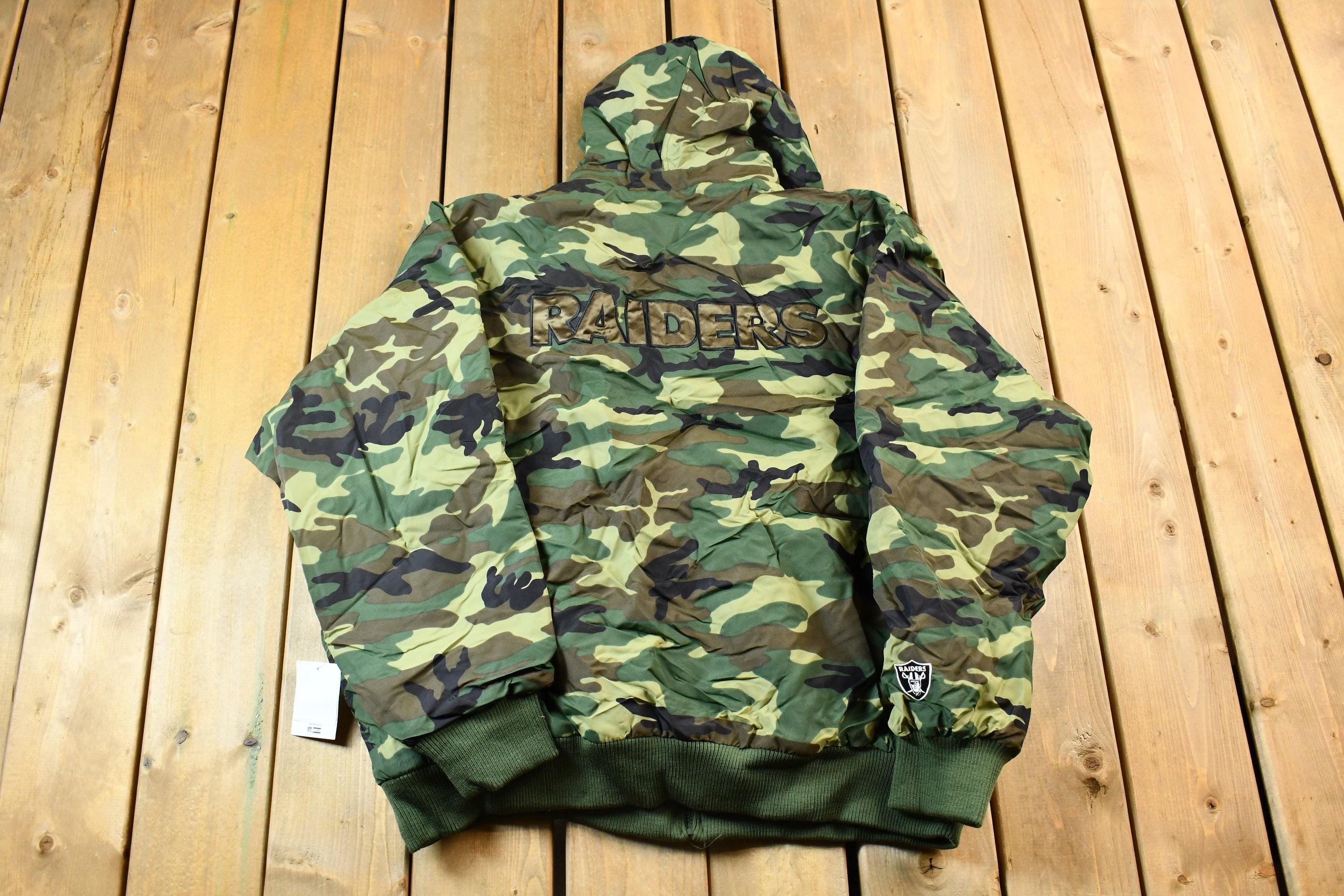 Vintage 1990s Camo Raiders NFL Football Hooded Puffer Jacket