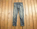 Vintage 1990s Levi's 521 Distressed Jeans Size 29x32