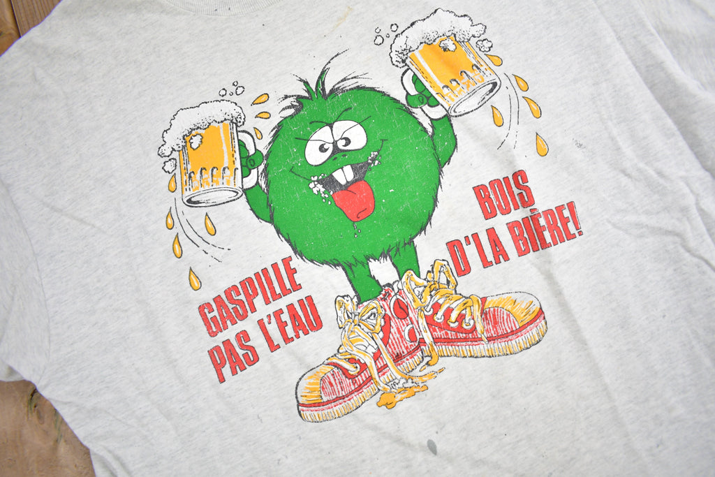 Vintage 1990s Gaspille Pas L'eau Bois D'La Biere Graphic T Shirt
