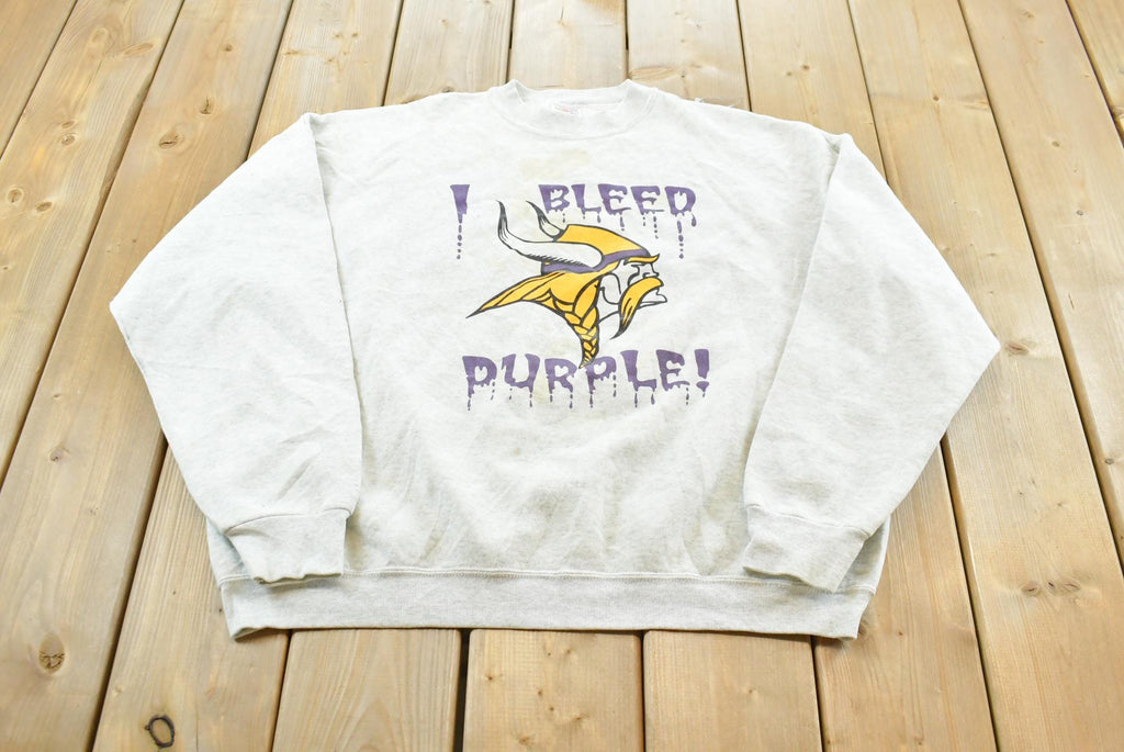 Vintage 1990s Minnesota Vikings I Bleed Purple NFL Crewneck Sweatshirt Mens M / 90's Americana Football Sportswear / Fruit of the Loom