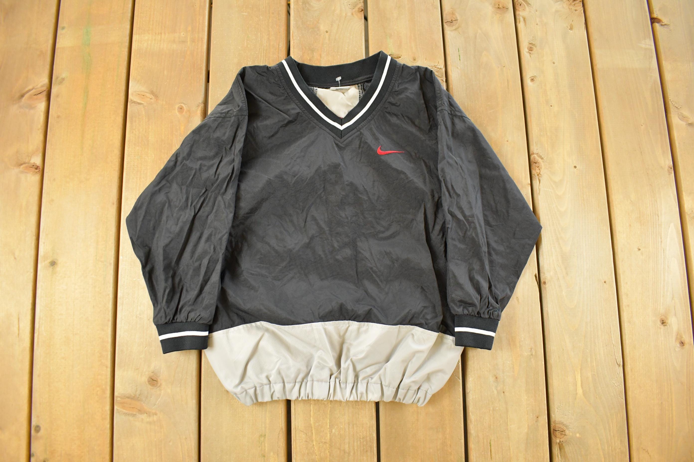 Vintage 1990s Nike Embroidered Mini Swoosh Pullover Windbreaker Youth Small