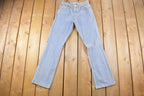 Vintage 1990s Levi's 550 Red Tab Denim Jeans Size 26 x 31 / Vintage Denim / Streetwear / Jeans / Made In USA / Vintage Levi's