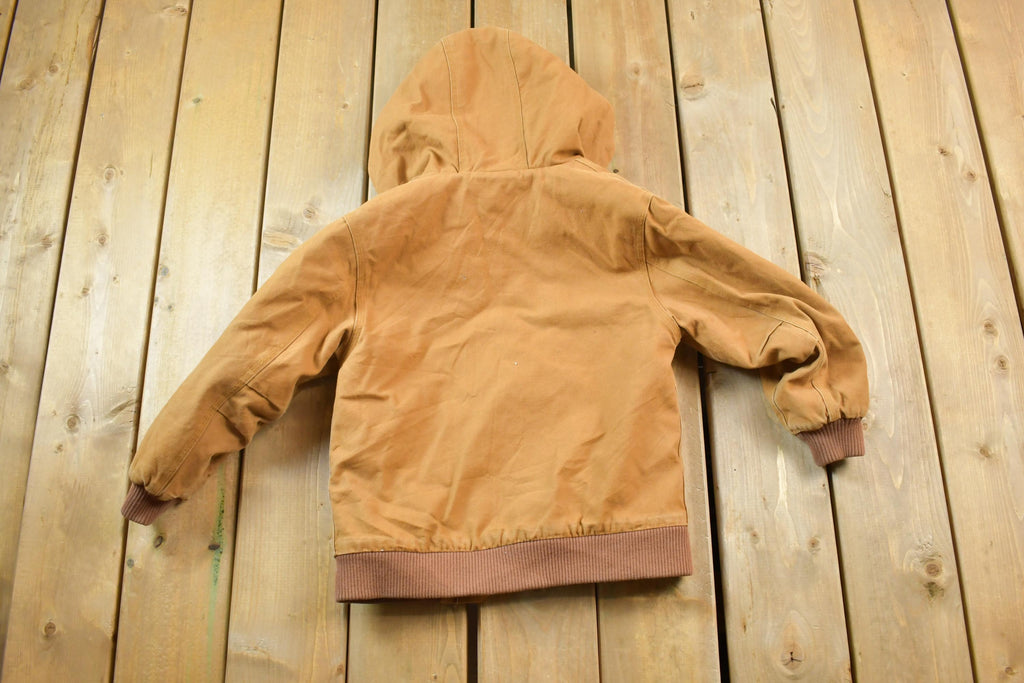Vintage 1990s Distressed Carhartt Youth Chore Jacket Made In USA