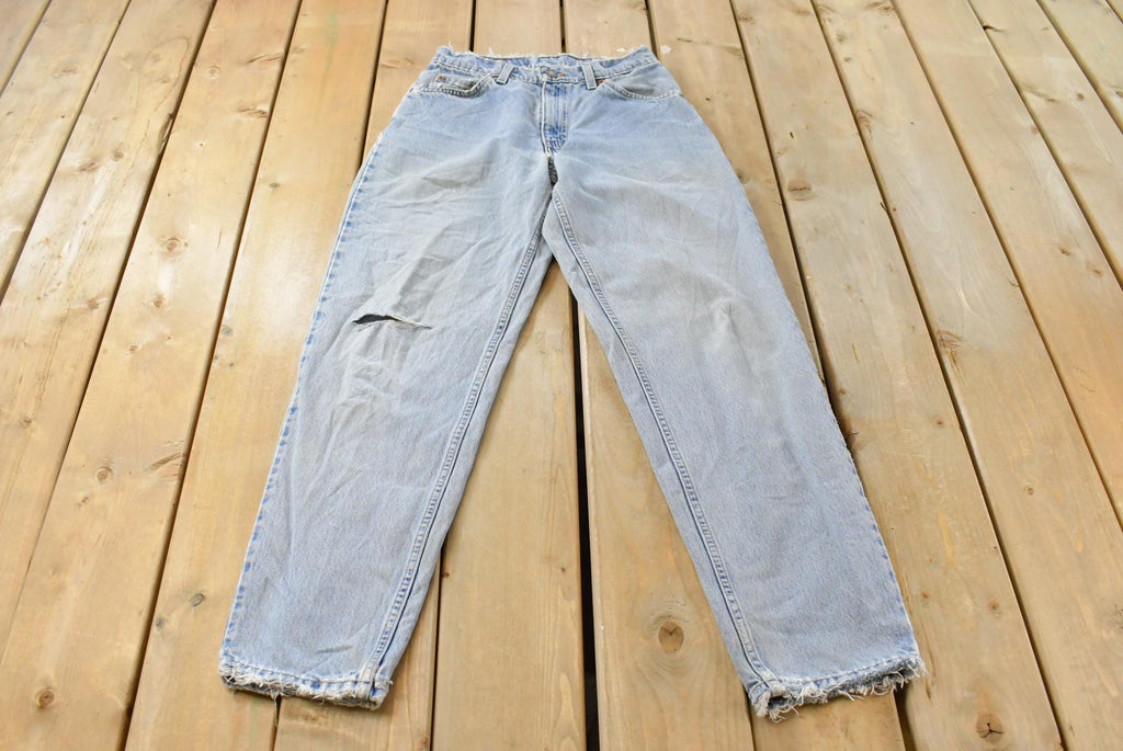Vintage 1990s Levi's 560 Loose Tapered Denim Jeans Men's 26 x 31 / 90s Levi's / Distressed Sun Faded Jeans