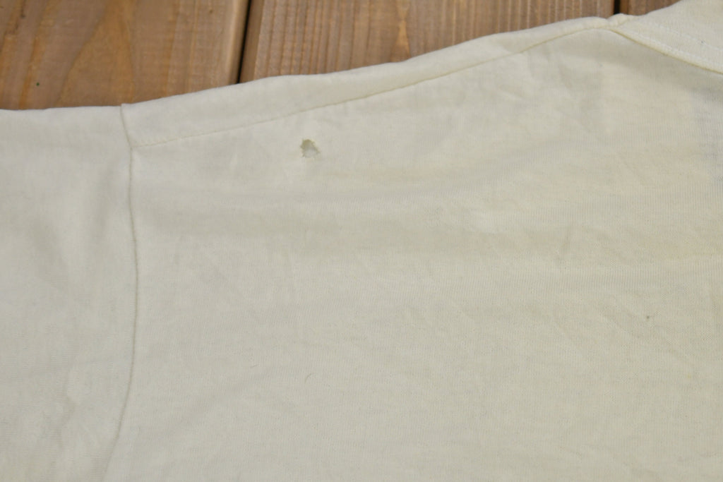 Vintage 1990s La Face Du Monde Évolue Technilab Graphic T Shirt
