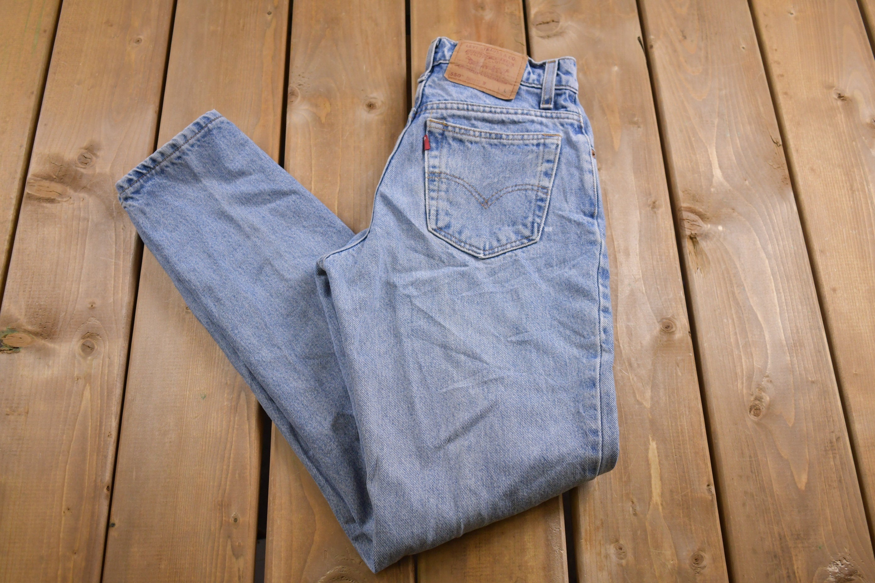 Vintage 1990s Levi's 550 Red Tab Jeans Size 26 x 23 / 90s Denim / Streetwear Fashion / Vintage Denim / Jeans / Light Wash / Vintage Levi's