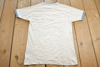 Vintage 1980s "I Got It At Flanigan's" Brother Jims Ft Lauderdale Souvenir Ringer Shirt