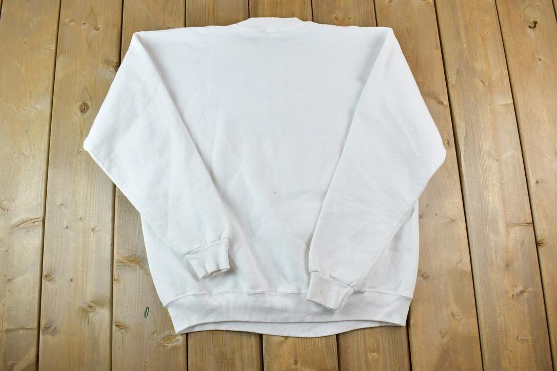 Vintage 1990s Dave's Sport Shop Russell Athletic Crewneck Sweatshirt