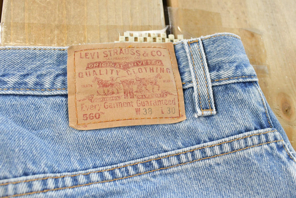 Vintage 1990s Levi's 560 Loose Fit Denim Blue Jeans Size 35 x 30 / 90s Levi's / Distressed Sun Faded Jeans / Streetwear