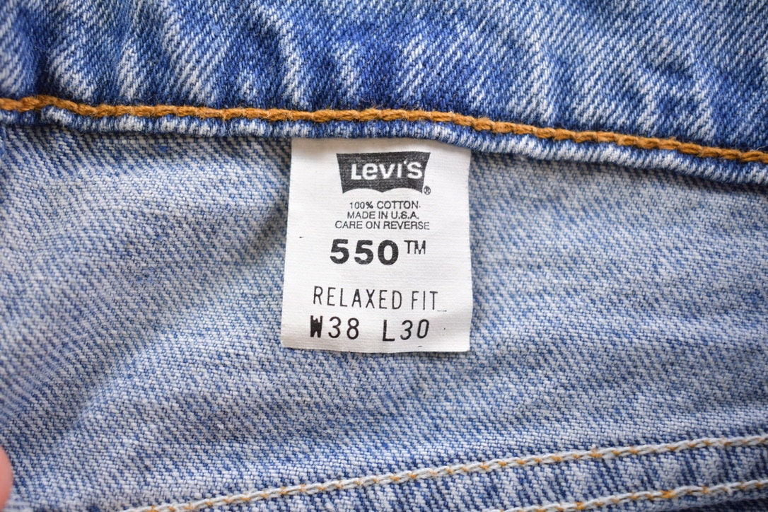 Vintage 1990s Levi 550 Red Tab Jeans Size 36 x 29