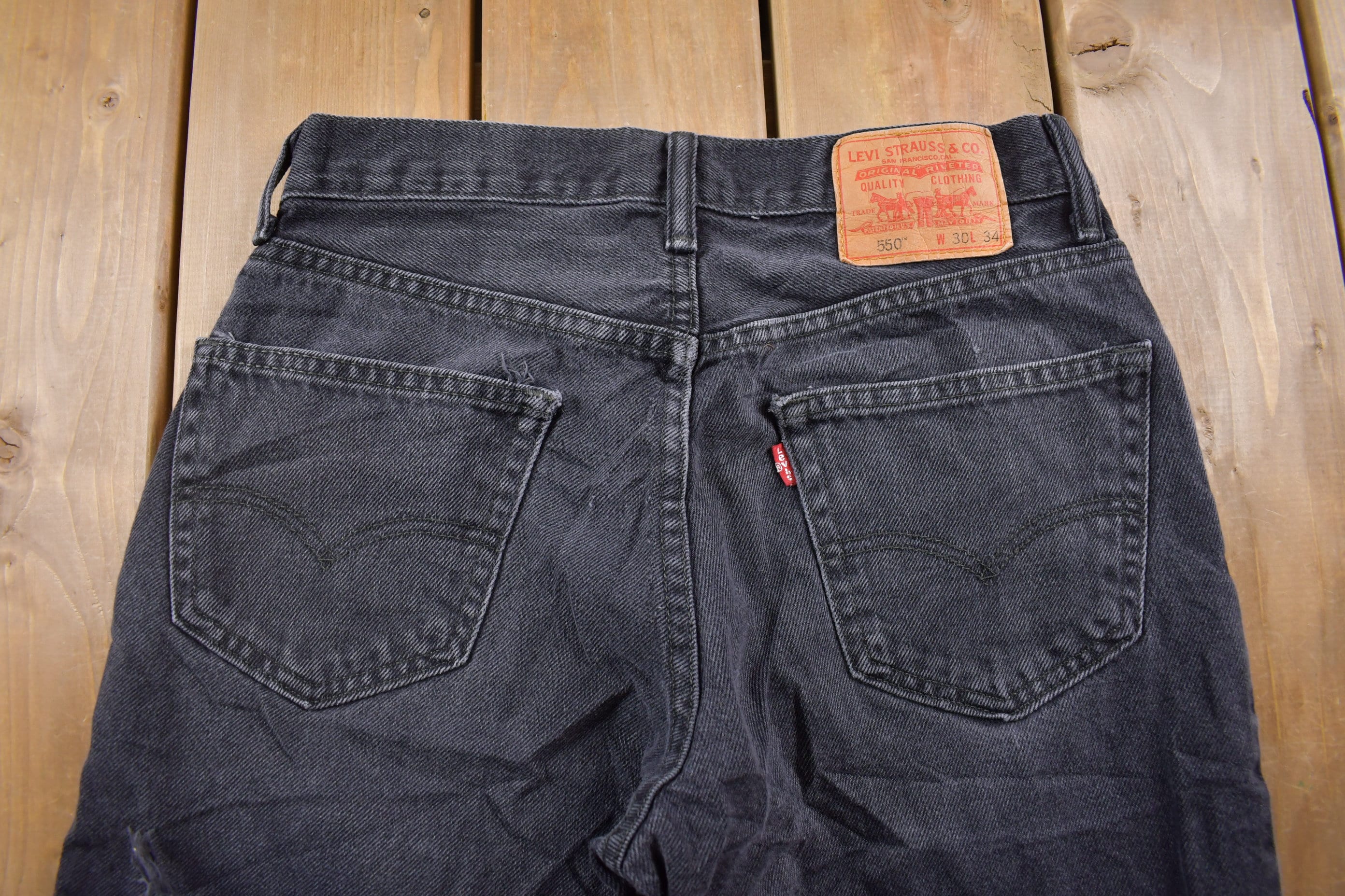 Vintage 1990s Levi's Distressed 550 Red Tab Jeans Size 30 x 32