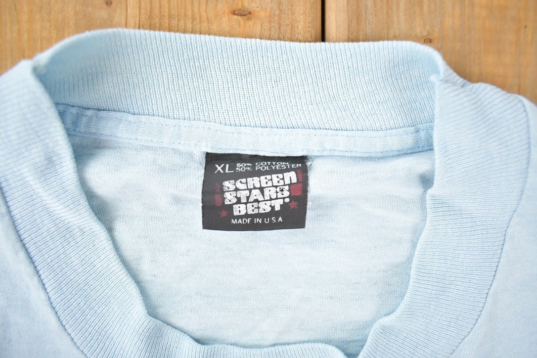 Vintage 1990s People Like Us Single Stitch Graphic T Shirt Made In USA